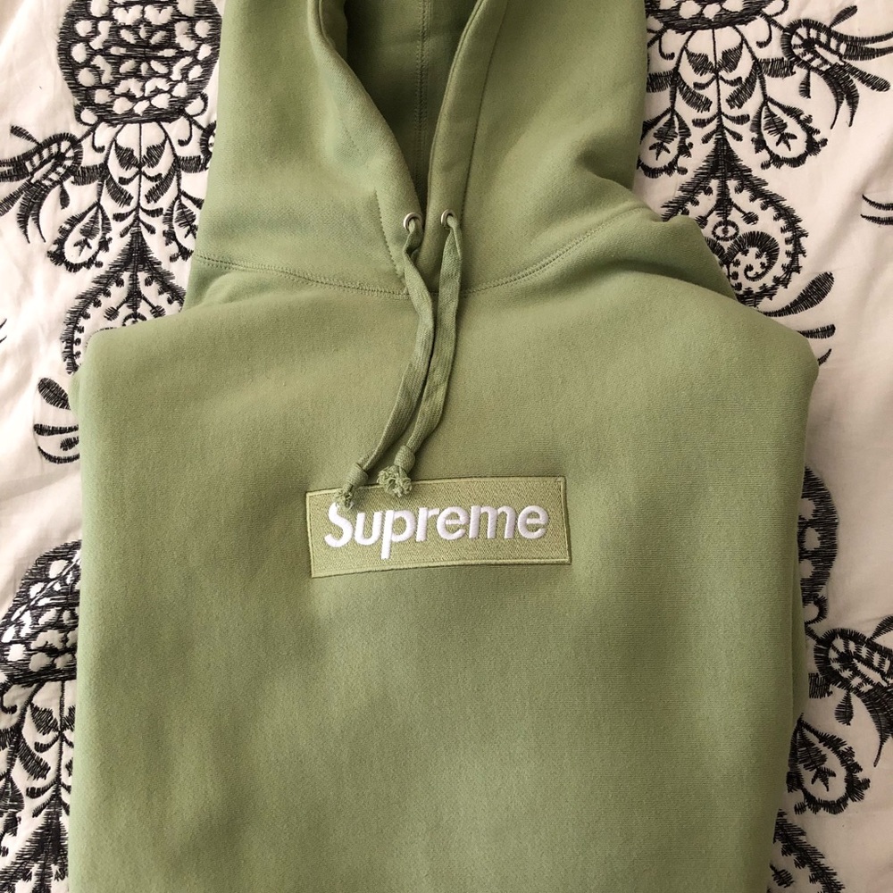 Sage green box logo